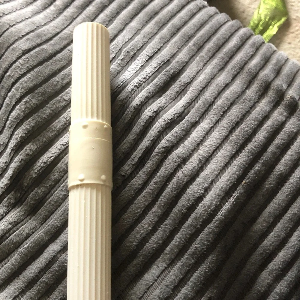 White Ribbed Plastic Roller Tool tooth brush container